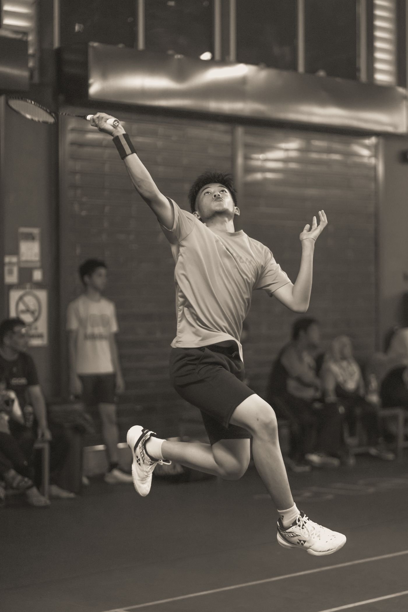 Player mid-smash during a match